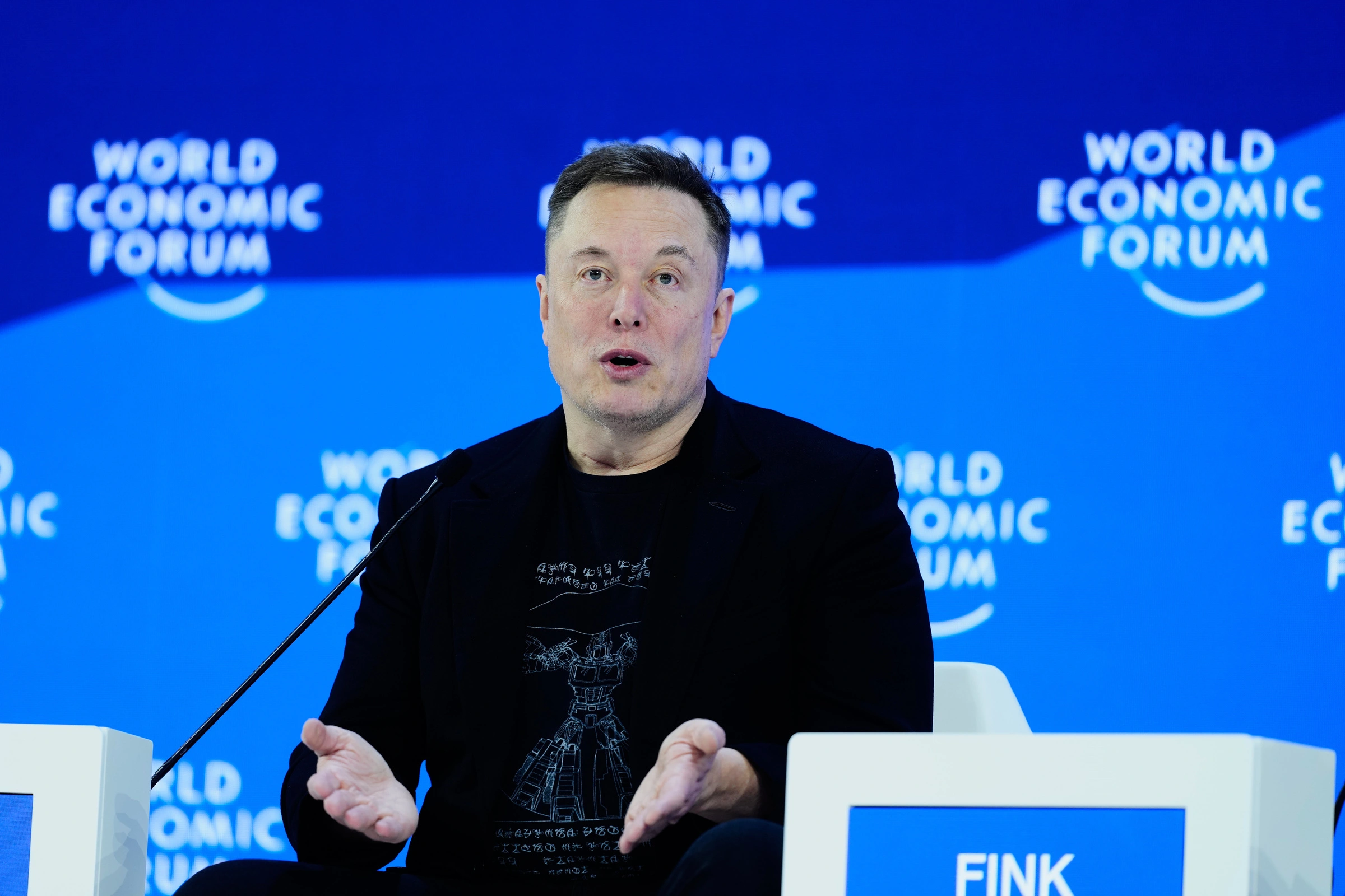 Elon Musk tại Diễn đàn Kinh tế Thế giới, nơi ông thường xuyên chia sẻ về tầm nhìn công nghệ tương lai (Ảnh: AP).