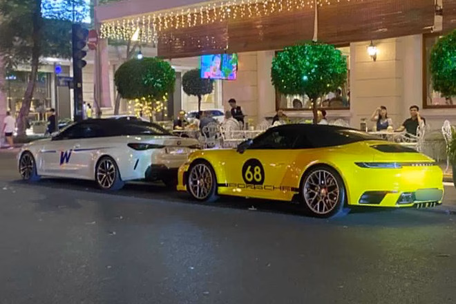 Sự kết hợp giữa Porsche 911 S Cabriolet và BMW 430i tạo nên khung cảnh sang trọng trên đường phố Sài Gòn. Ảnh: Trí Đức